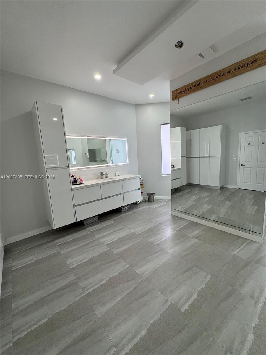 15053 Southwest 40th Street Davie, FL 33331 - Photo 18 of 36 Master Bathroom with plenty of storage. This is the left side.