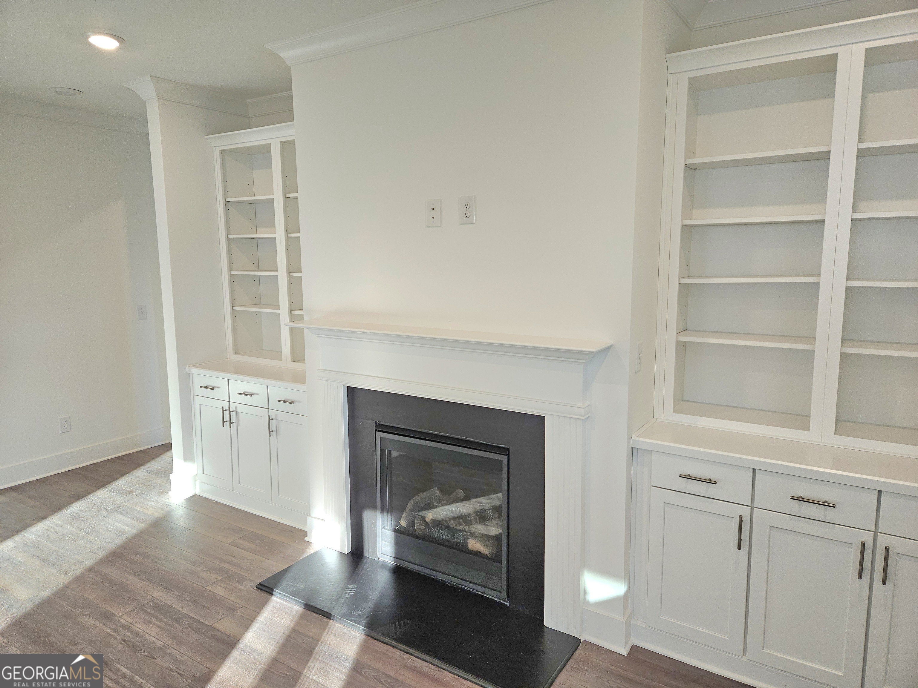 219 Andalusa Court Dallas, GA 30132 - Photo 11 of 50 a living room with furniture and a fireplace