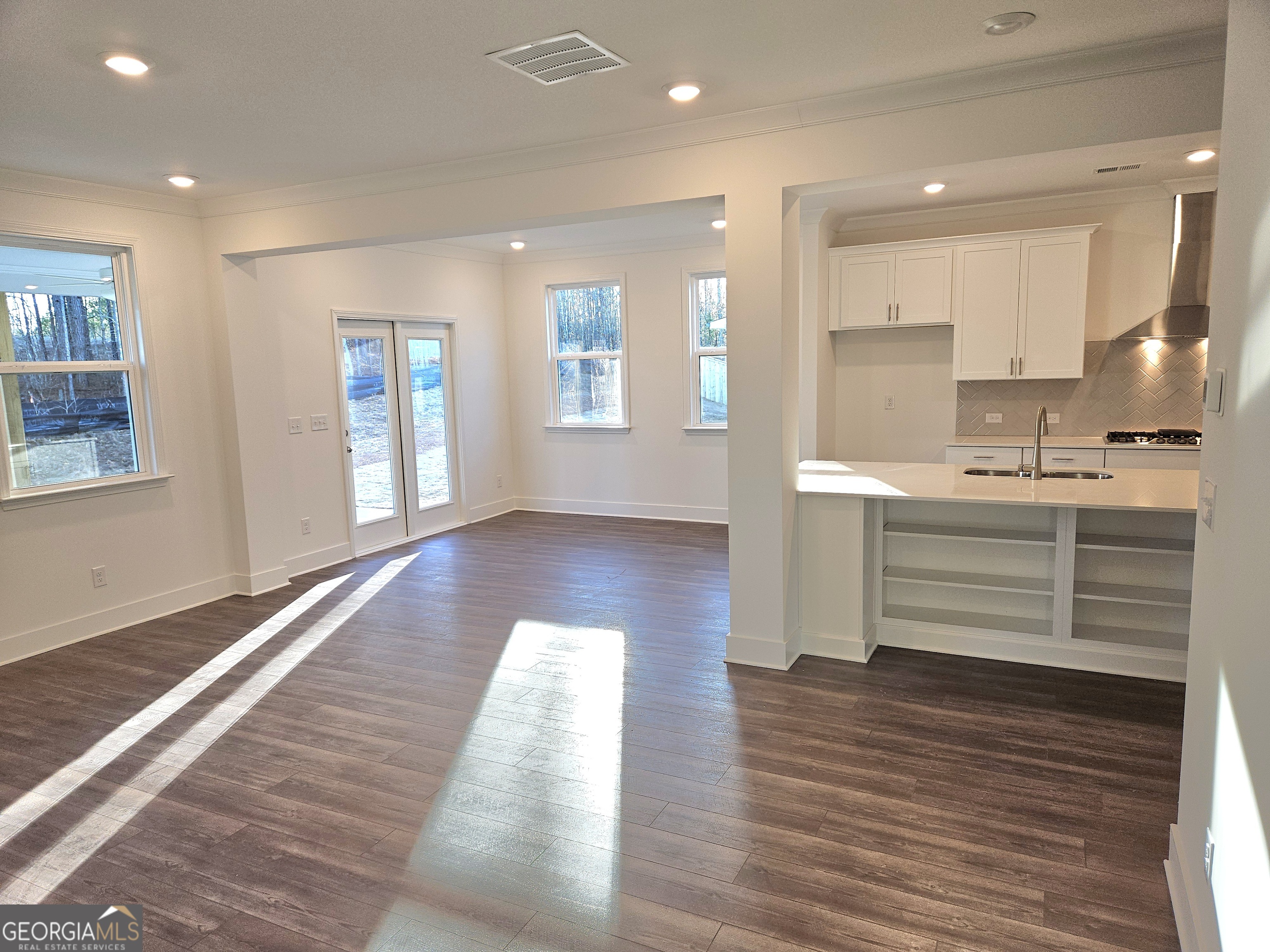 219 Andalusa Court Dallas, GA 30132 - Photo 17 of 50 a room view with wooden floor and window