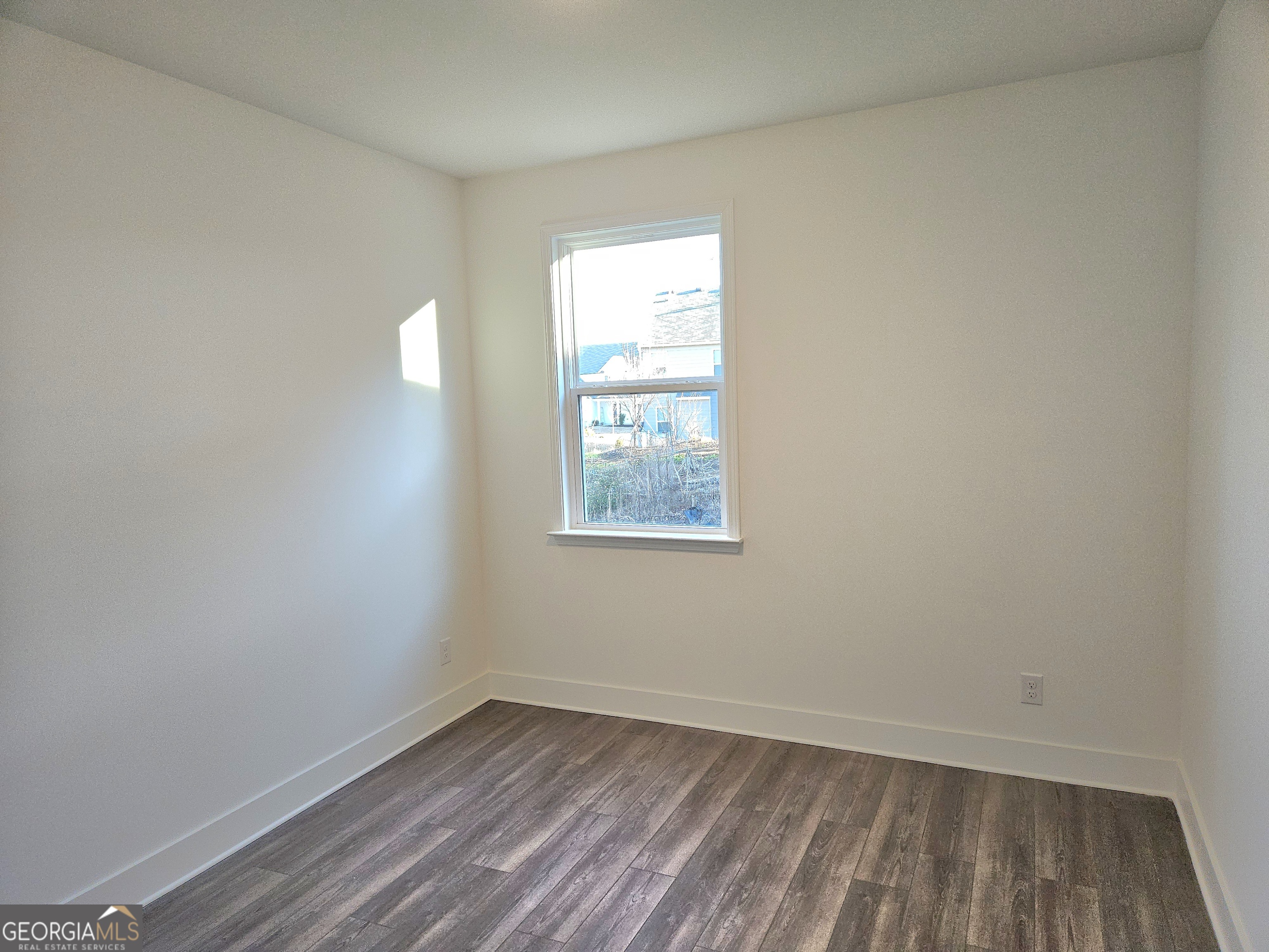 219 Andalusa Court Dallas, GA 30132 - Photo 18 of 50 an empty room with a window