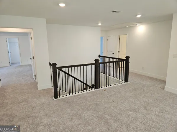 a view of a hallway with entryway