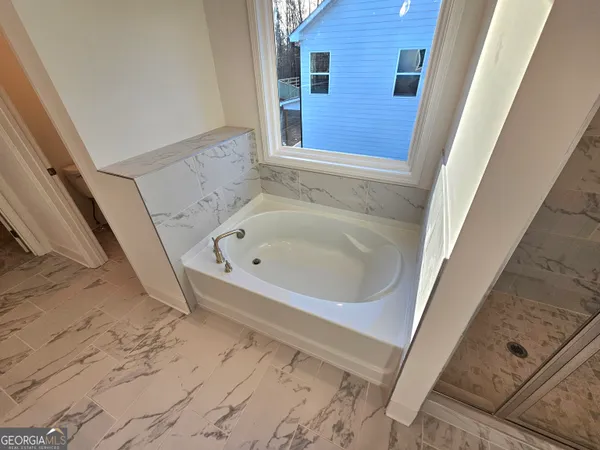 a bathroom with a bathtub