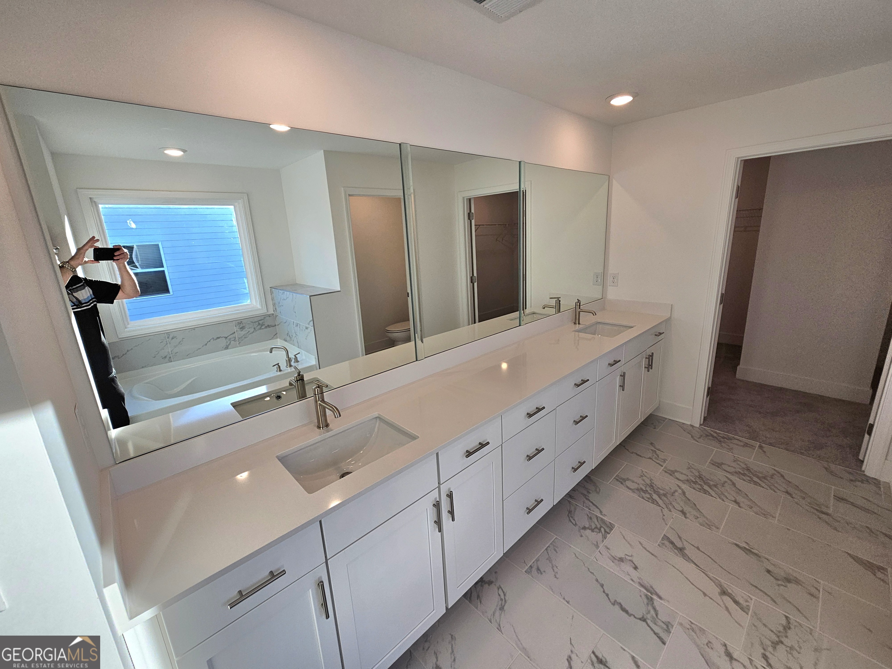 219 Andalusa Court Dallas, GA 30132 - Photo 36 of 50 a bathroom with double vanity sink and mirror