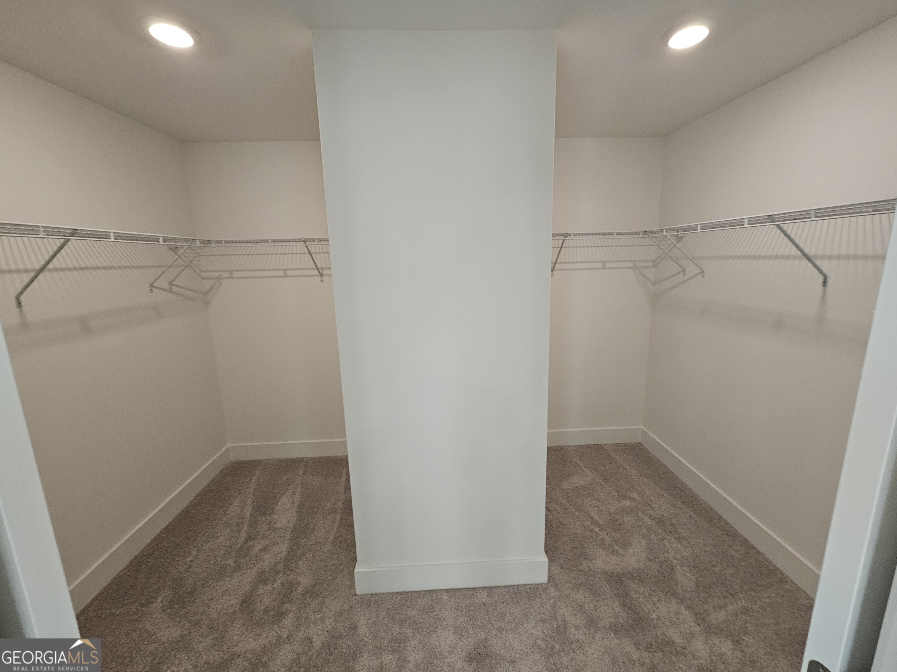 219 Andalusa Court Dallas, GA 30132 - Photo 37 of 50 a view of a room with racks on the wall