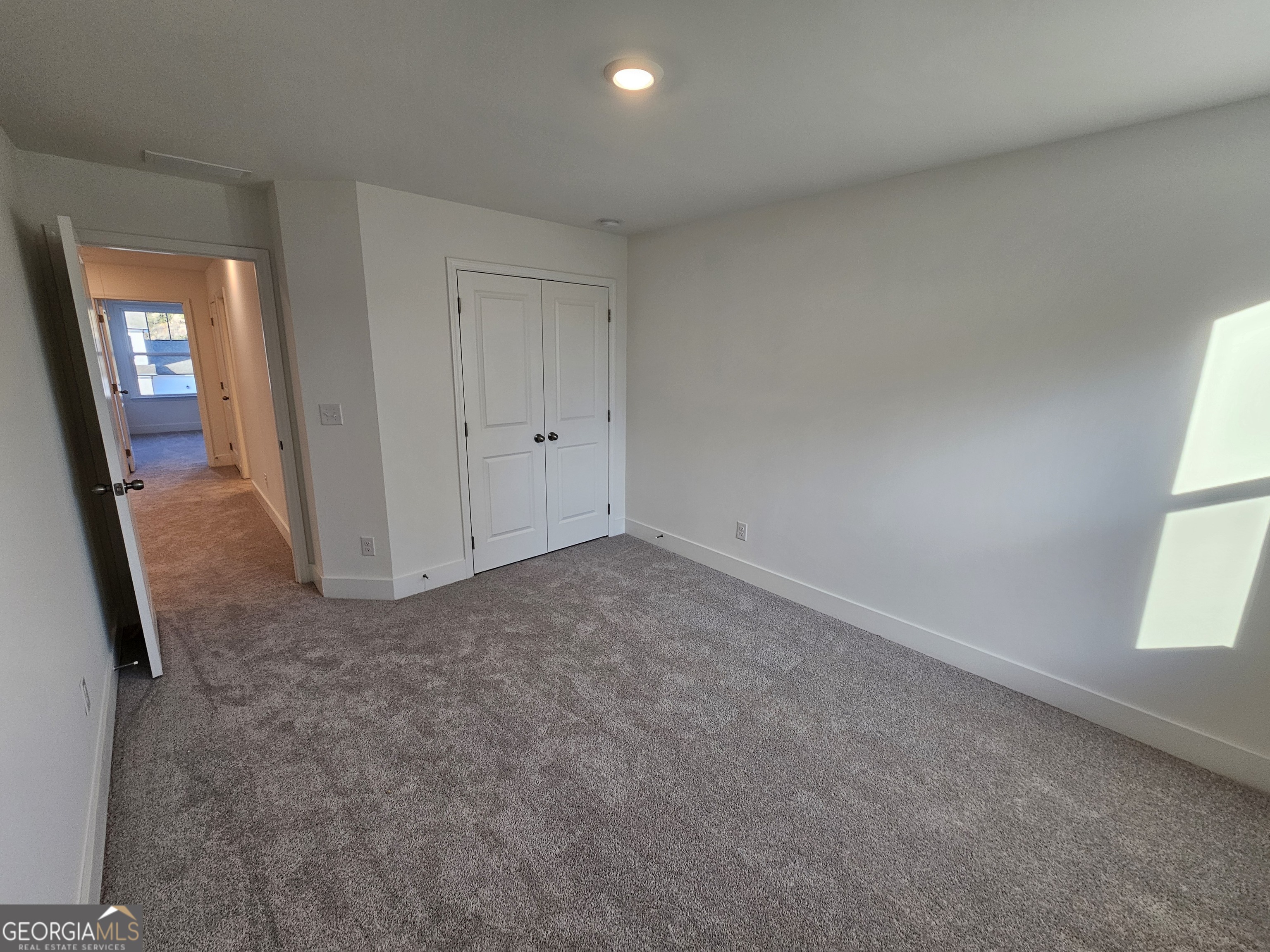 219 Andalusa Court Dallas, GA 30132 - Photo 41 of 50 an empty room with windows