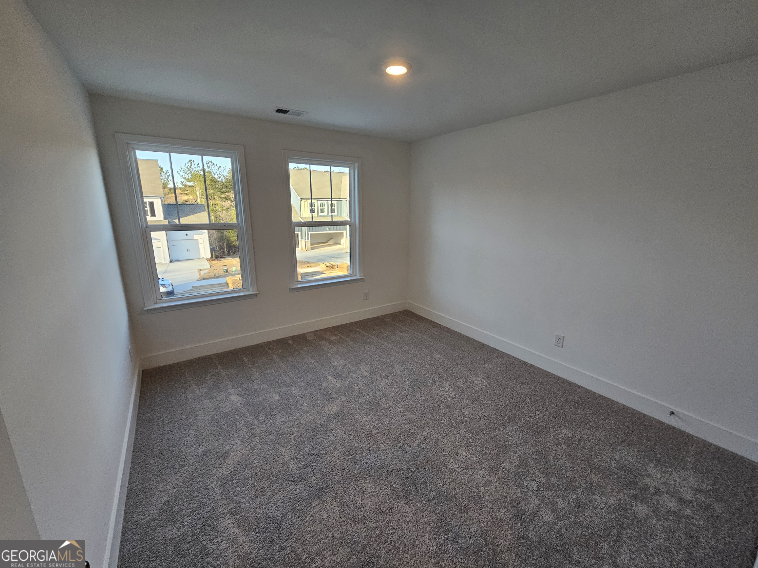 219 Andalusa Court Dallas, GA 30132 - Photo 42 of 50 an empty room with a window