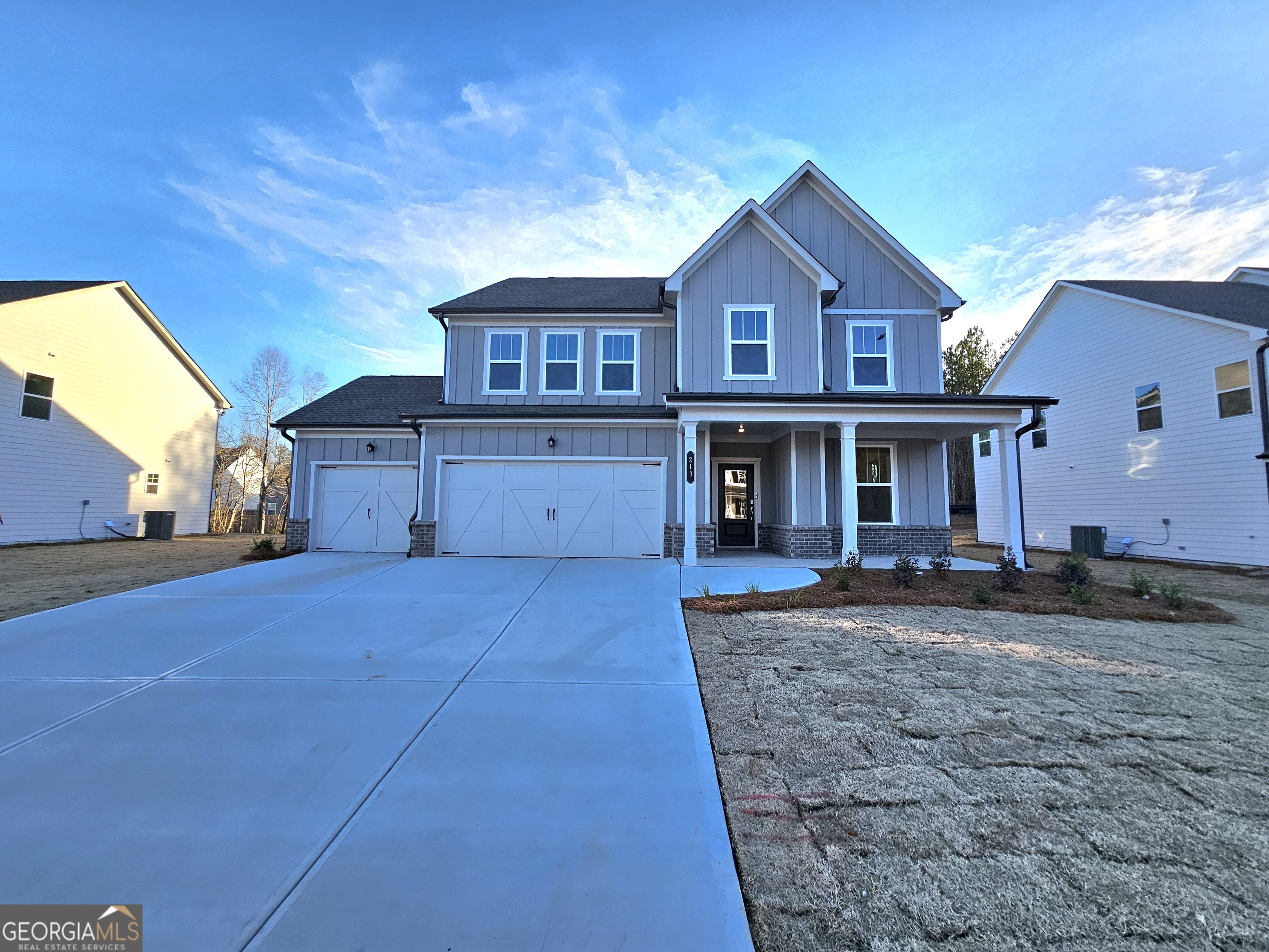 219 Andalusa Court Dallas, GA 30132 - Photo 50 of 50 a front view of a house with a yard and garage