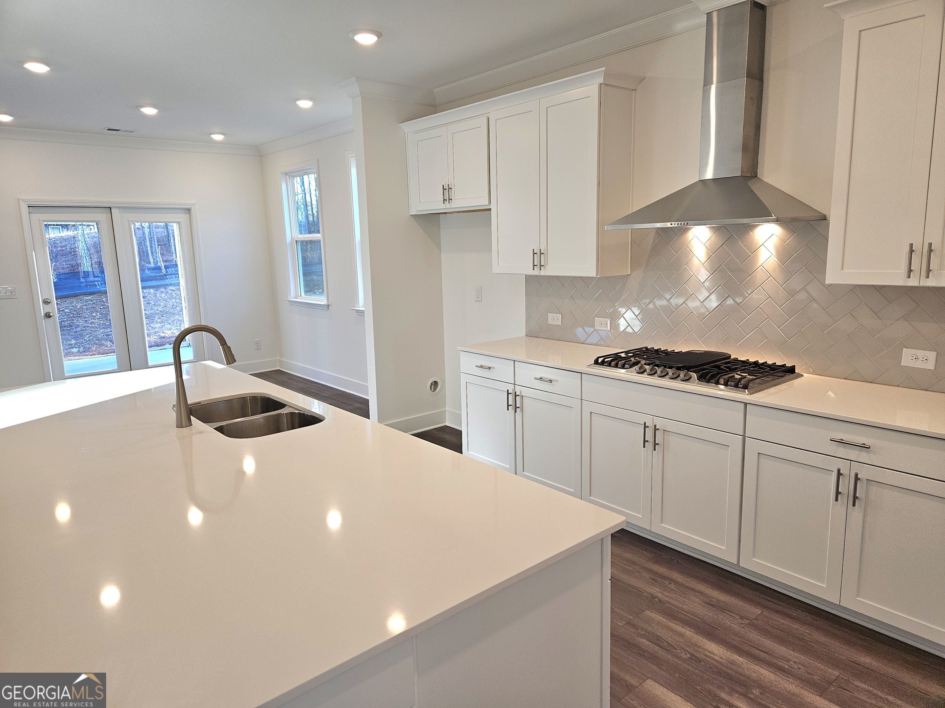 219 Andalusa Court Dallas, GA 30132 - Photo 5 of 50 a kitchen that has a lot of white cabinets and a stove