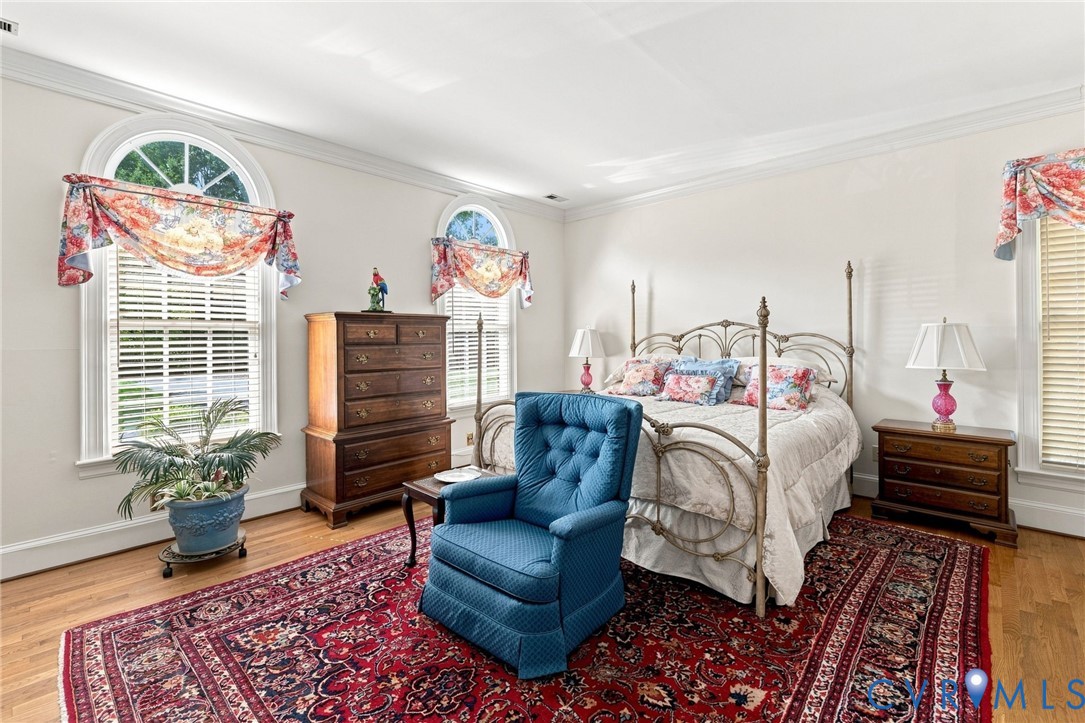 3950 Reeds Landing Circle Midlothian, VA 23113 - Photo 20 of 49 Hardwood flooring with arched windows, crown moldi