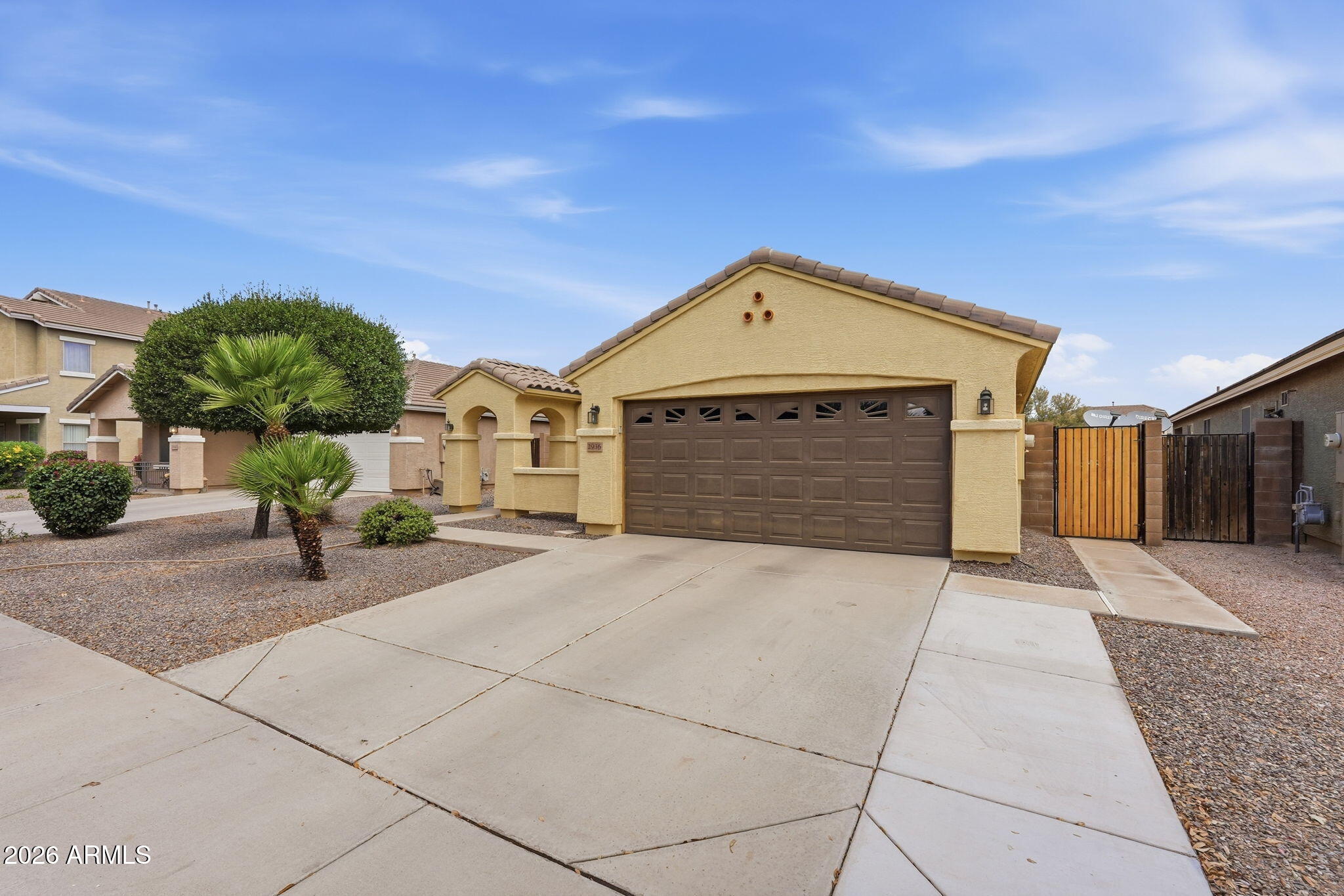 2936 East Crescent Way Gilbert, AZ 85298 - Photo 10 of 40 a front view of a house with yard