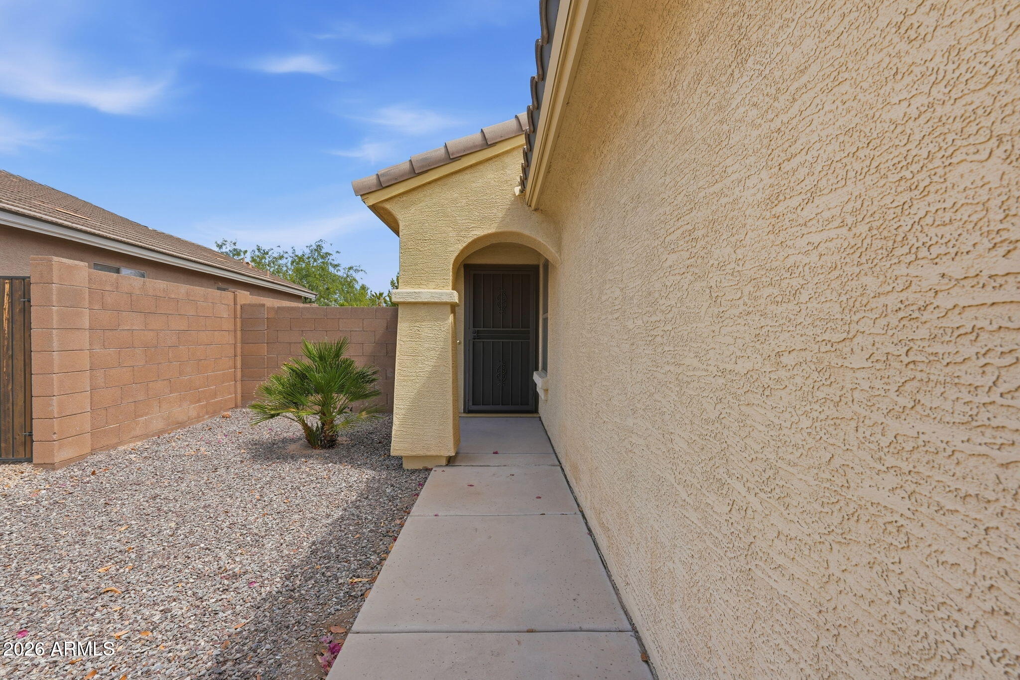 2936 East Crescent Way Gilbert, AZ 85298 - Photo 12 of 40 a front view of a house with a yard