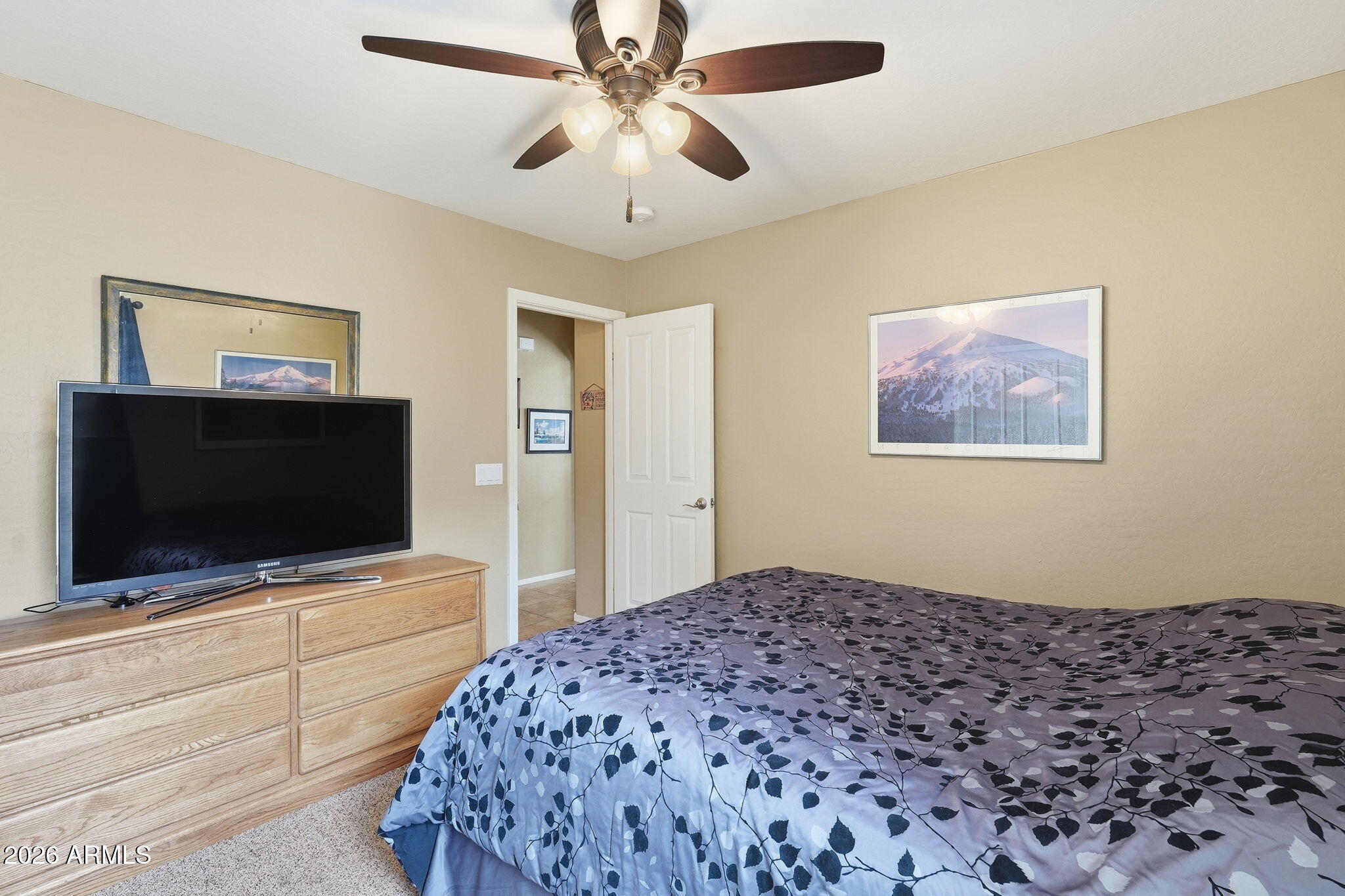 2936 East Crescent Way Gilbert, AZ 85298 - Photo 26 of 40 a bedroom with bed and flat screen tv