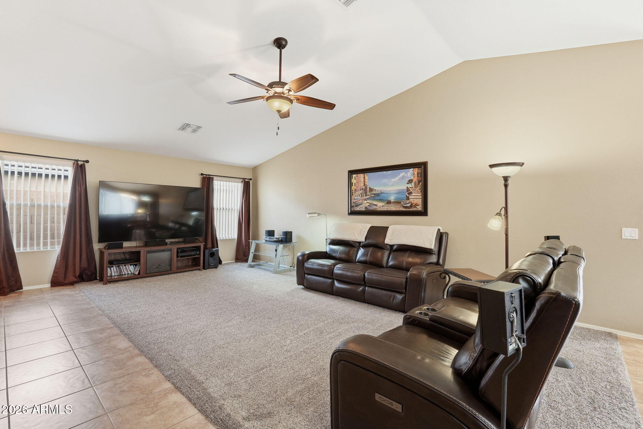 2936 East Crescent Way Gilbert, AZ 85298 - Photo 2 of 40 a living room with furniture and a flat screen tv