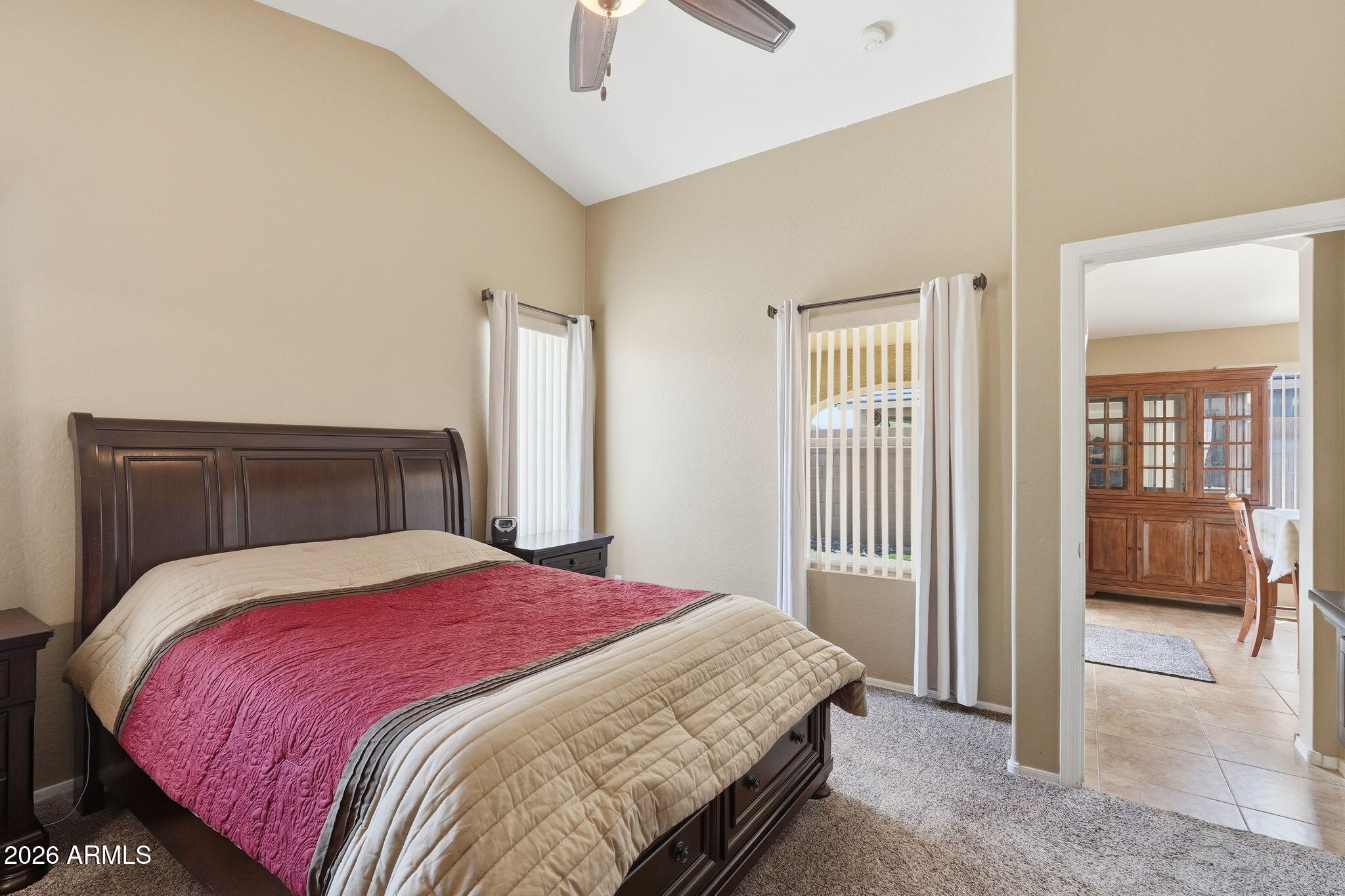 2936 East Crescent Way Gilbert, AZ 85298 - Photo 31 of 40 a bedroom with a large bed and a couch