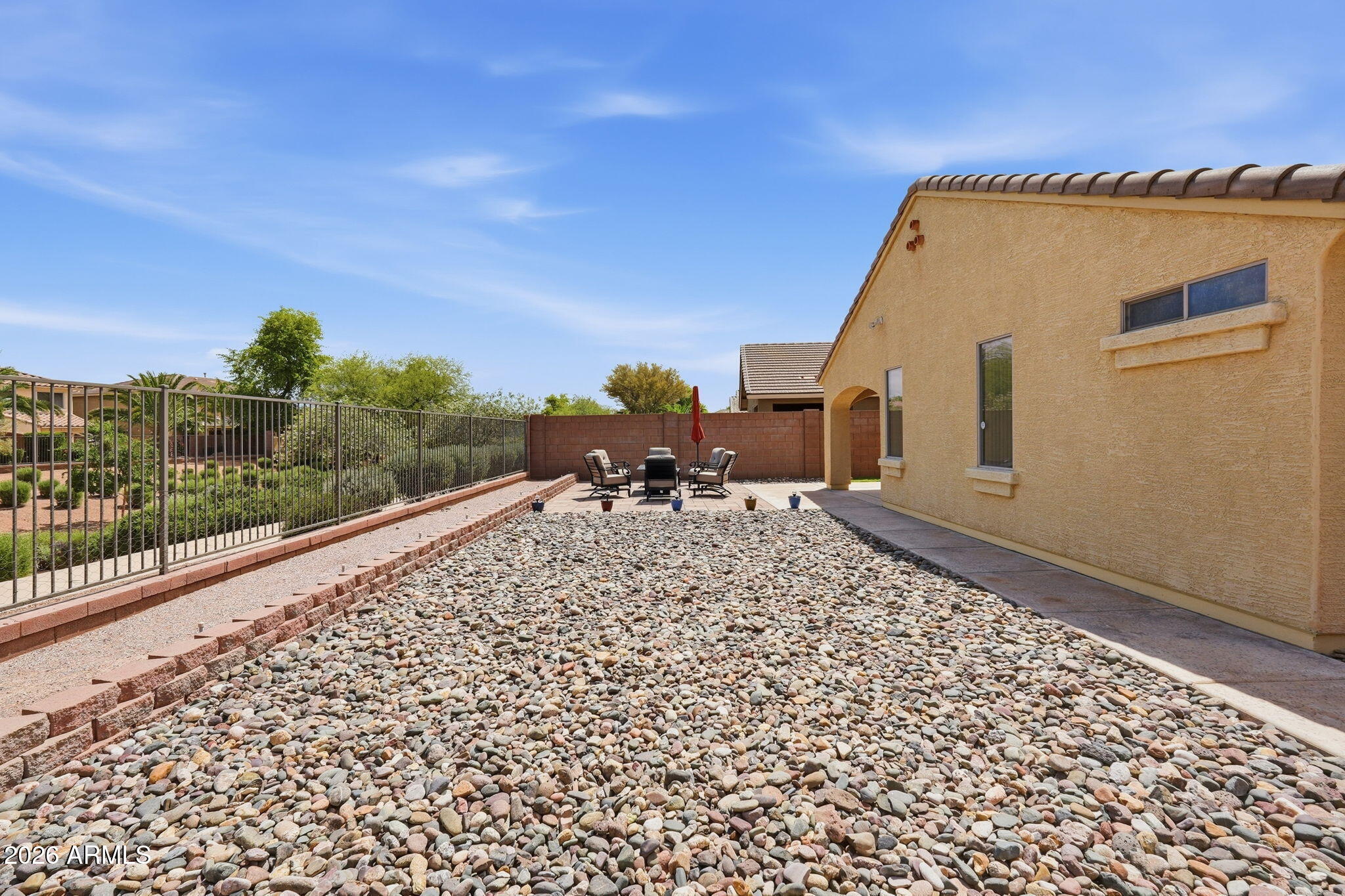 2936 East Crescent Way Gilbert, AZ 85298 - Photo 38 of 40 a balcony with table and chairs