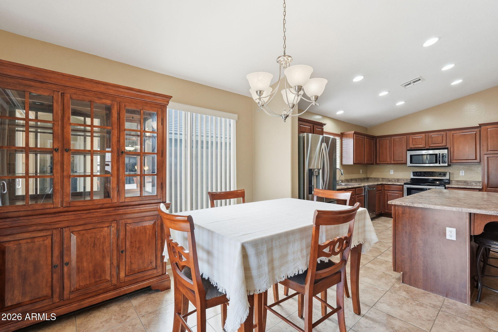 2936 East Crescent Way Gilbert, AZ 85298 - Photo 4 of 40 a view of a dining room with furniture window and wooden floor