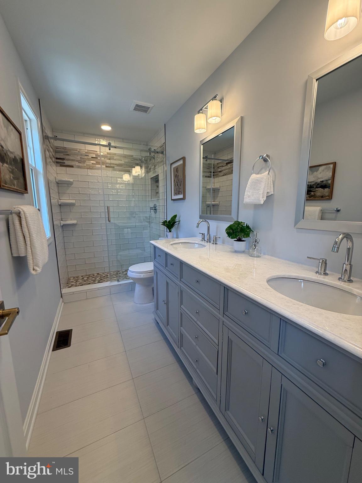 192 Hickory Point Road Pasadena, MD 21122 - Photo 18 of 53 Elegant bathroom with modern finishes.