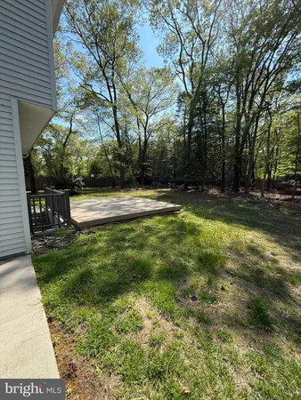 a house with yard in front of it