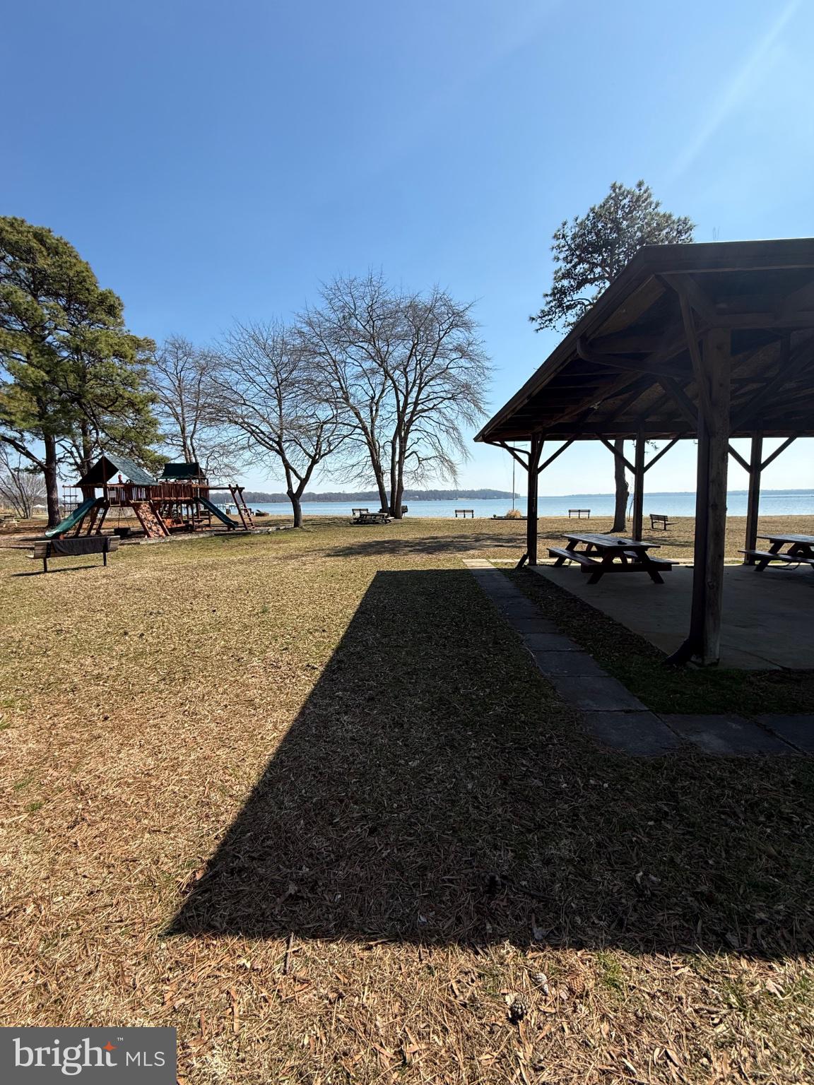 192 Hickory Point Road Pasadena, MD 21122 - Photo 47 of 53 Sunny park with playground and lake.