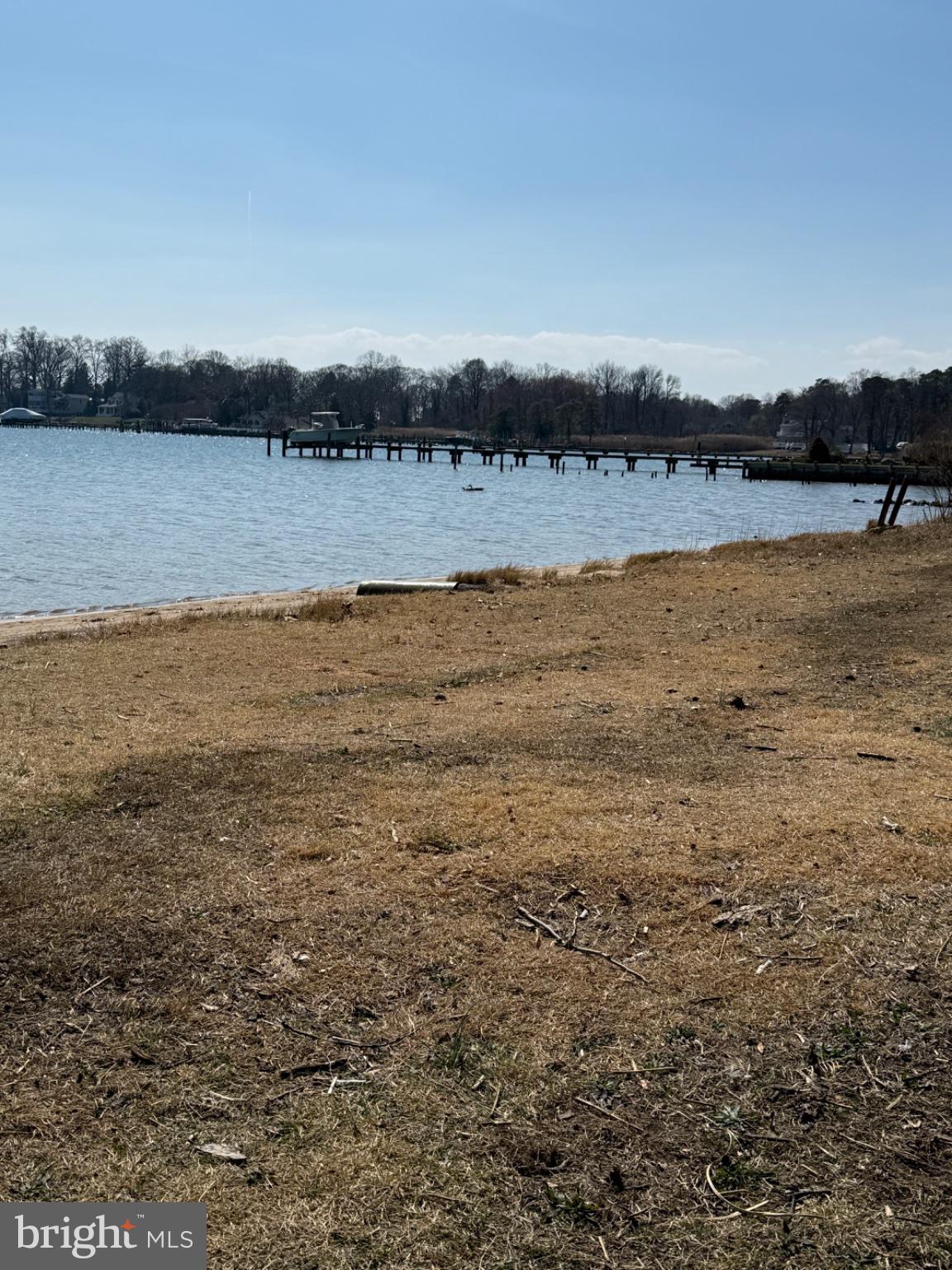 192 Hickory Point Road Pasadena, MD 21122 - Photo 51 of 53 Serene lakeside view on a sunny day.
