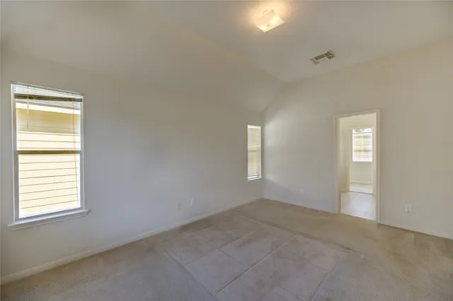 an empty room with an entryway