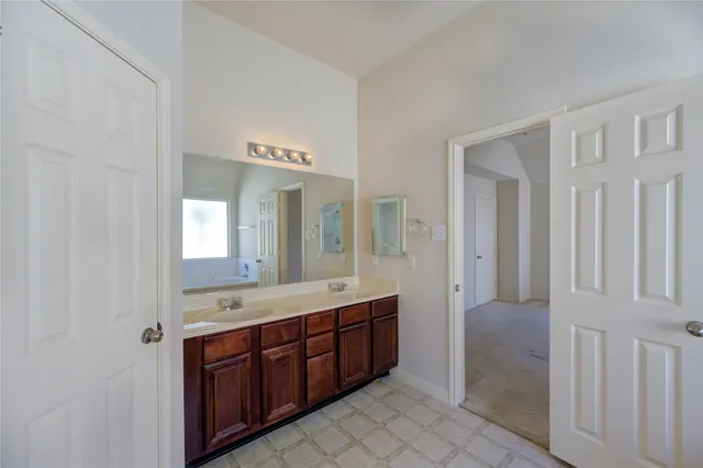a bathroom with a sink and a bathtub