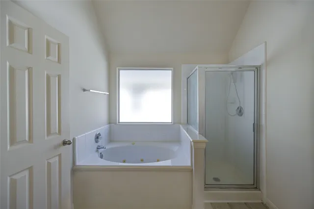 a view of a hallway with entryway