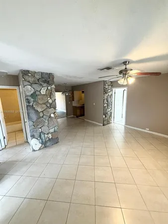 a view of a livingroom with furniture