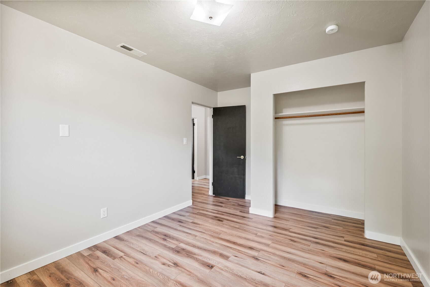 2943 Magnolia Street Longview, WA 98632 - Photo 22 of 36 a view of an empty room with wooden floor