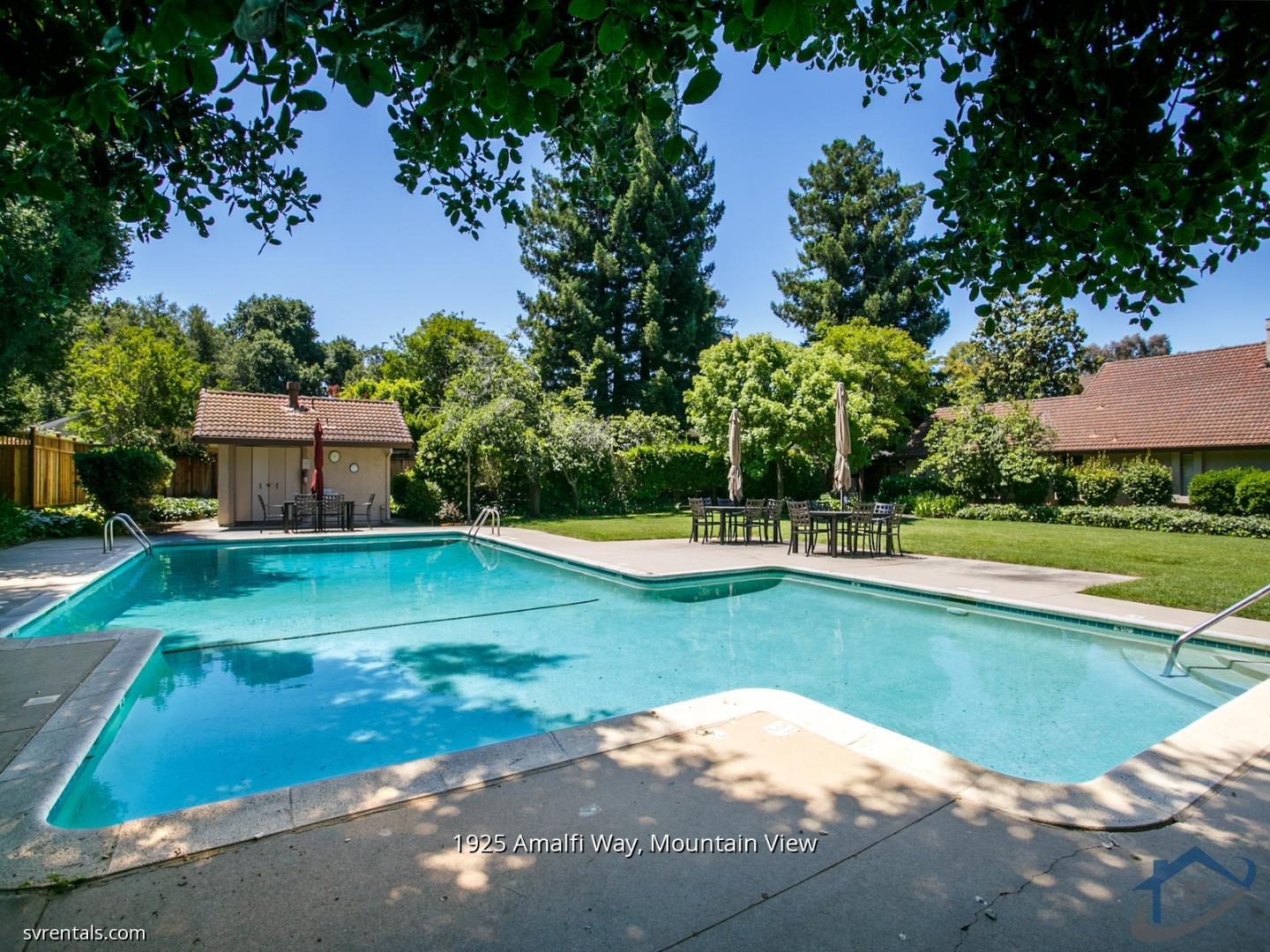 1925 Amalfi Way Mountain View, CA 94040 - Photo 23 of 23 a view of a house with swimming pool and yard