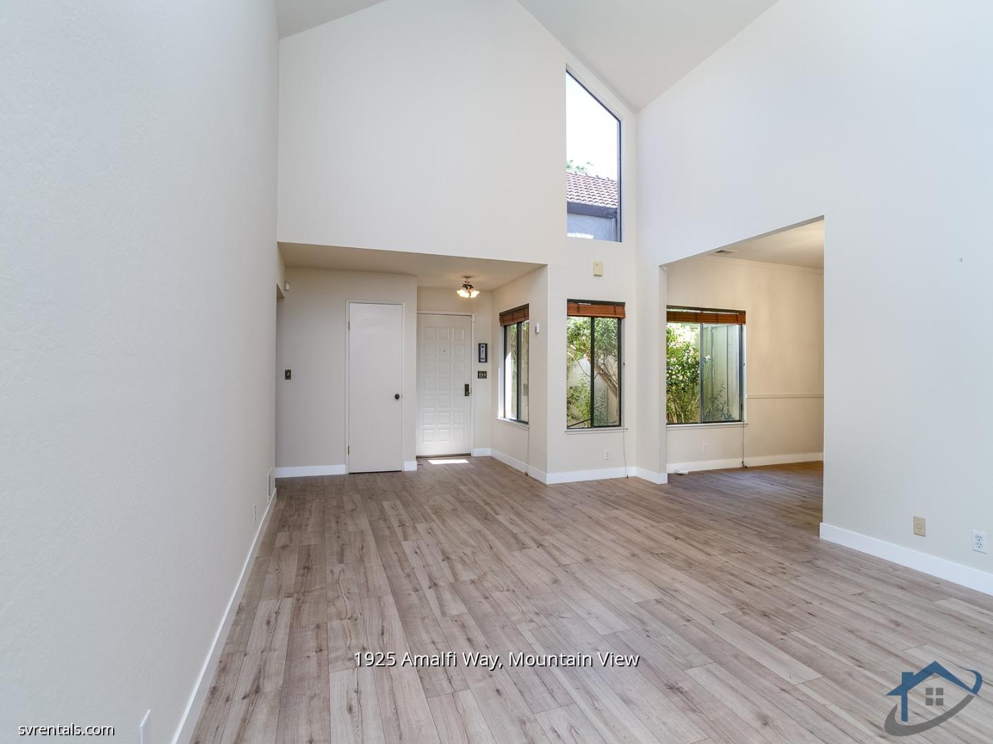 1925 Amalfi Way Mountain View, CA 94040 - Photo 5 of 23 wooden floor in an empty room with a window
