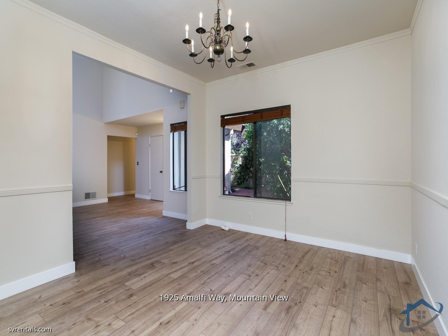 1925 Amalfi Way Mountain View, CA 94040 - Photo 9 of 23 wooden floor in an empty room with a window