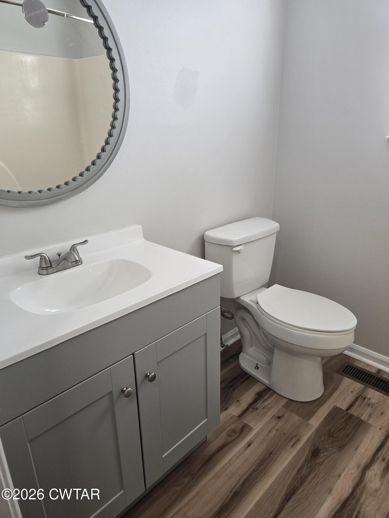 157 Dustin Drive Jackson, TN 38301 - Photo 14 of 22 a bathroom with a sink and a mirror