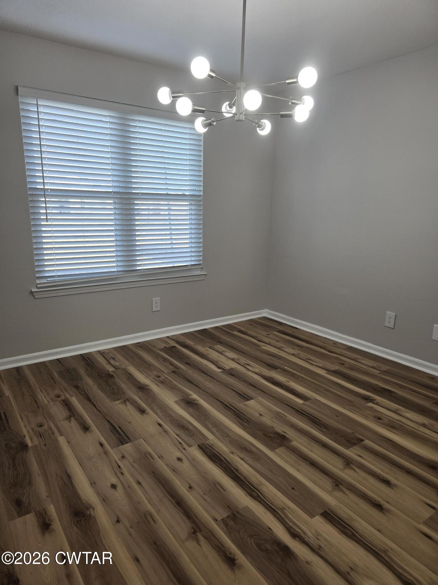 157 Dustin Drive Jackson, TN 38301 - Photo 4 of 22 a view of empty room with window