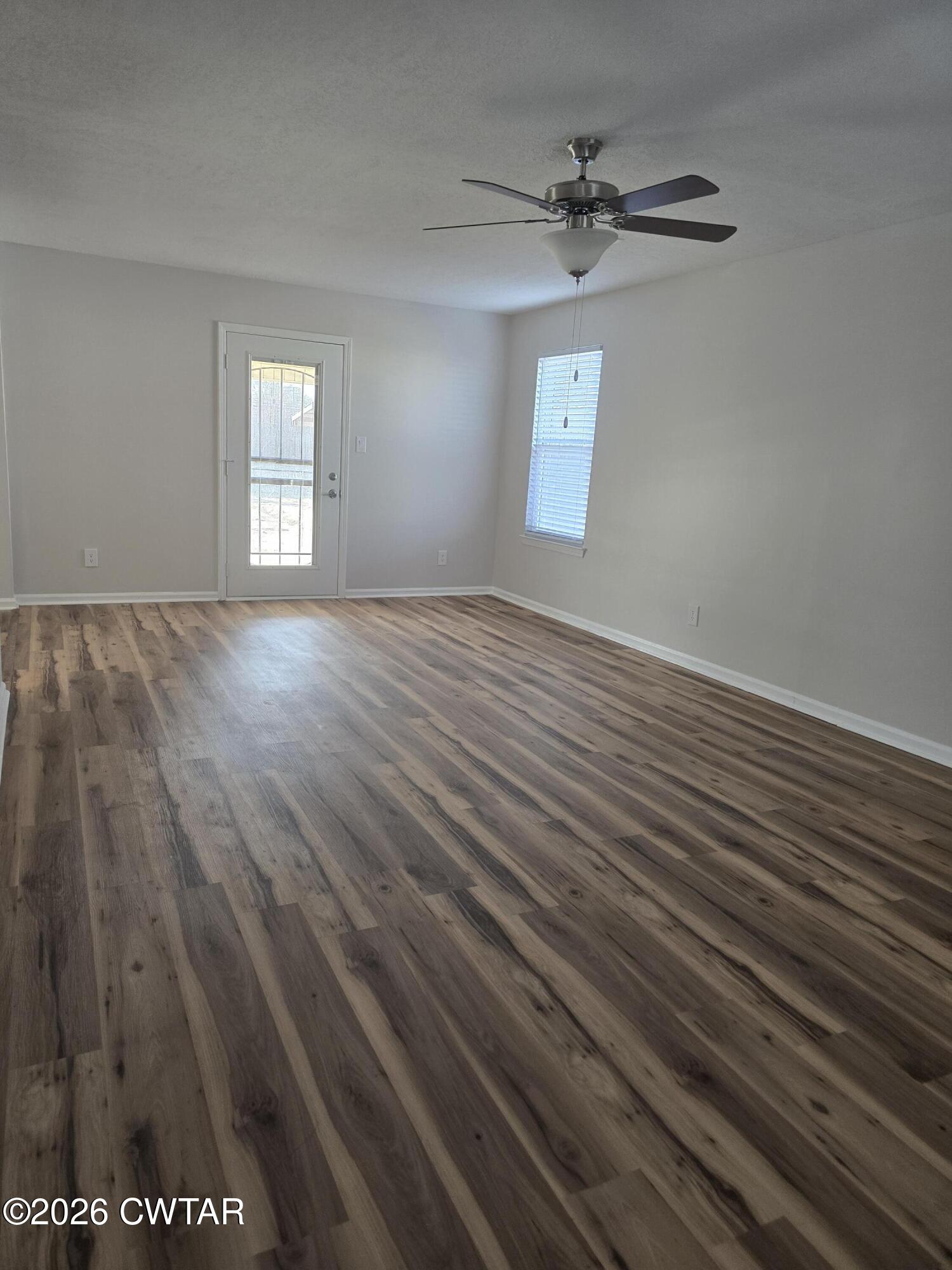157 Dustin Drive Jackson, TN 38301 - Photo 6 of 22 wooden floor in an empty room