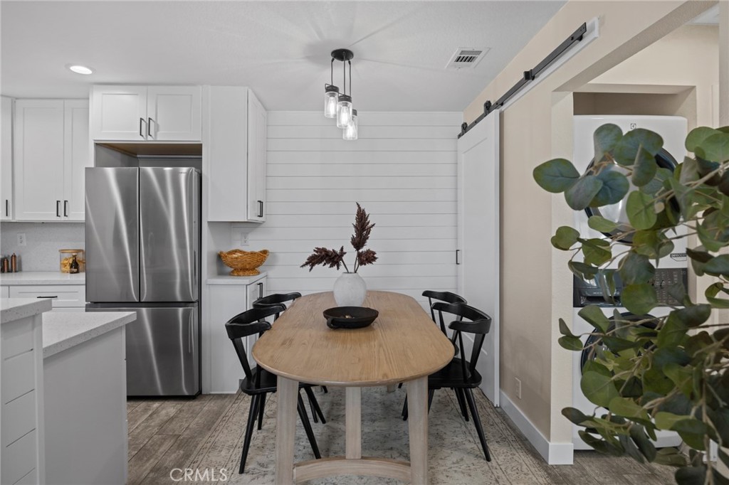 7 Rosa Rancho Santa Margarita, CA 92688 - Photo 5 of 22 a kitchen with refrigerator and microwave