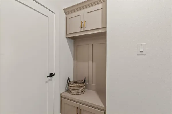 an aerial view of a house with a lake view