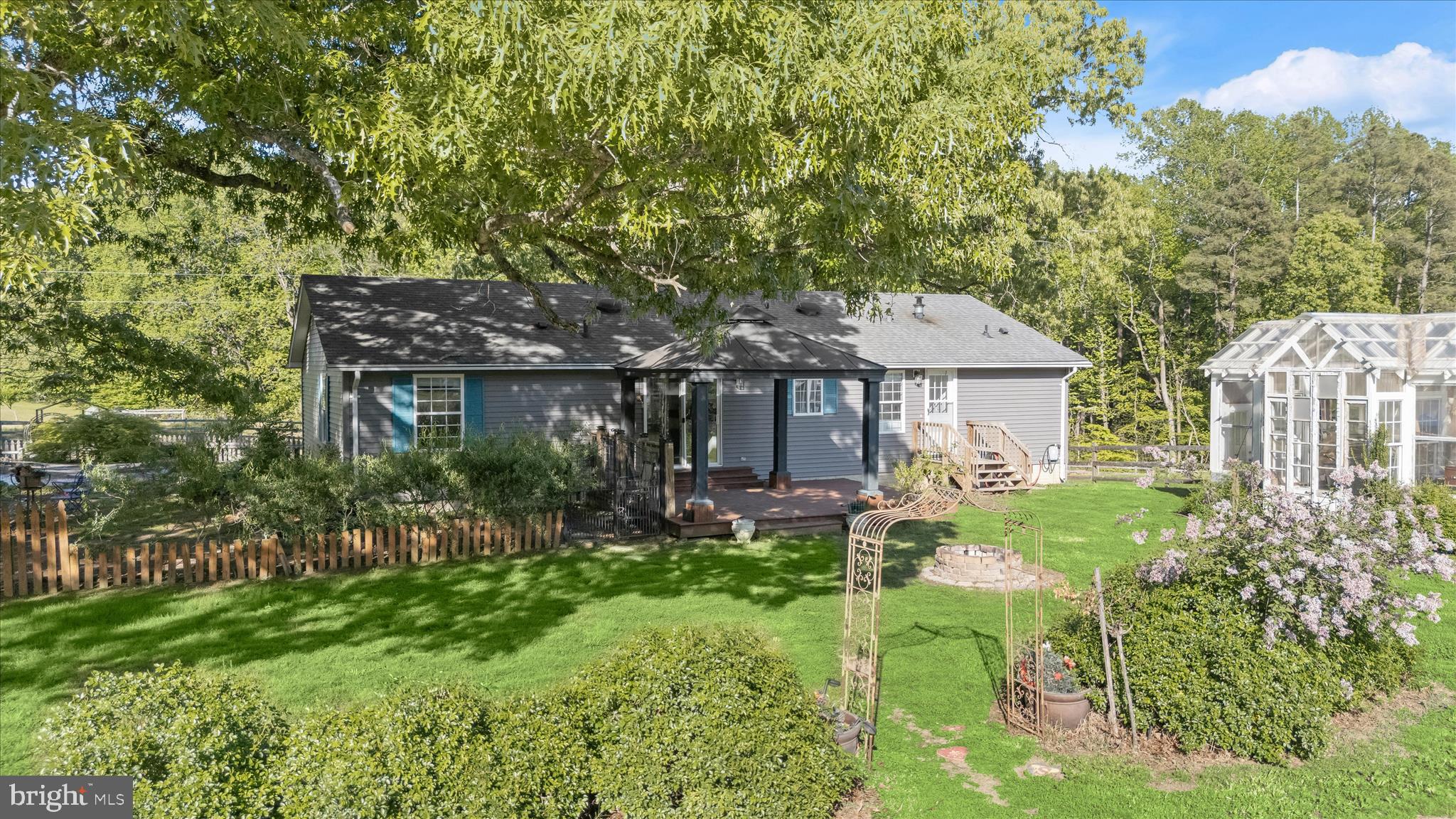 3325 Allday Road Huntingtown, MD 20639 - Photo 33 of 77 a front view of a house with garden