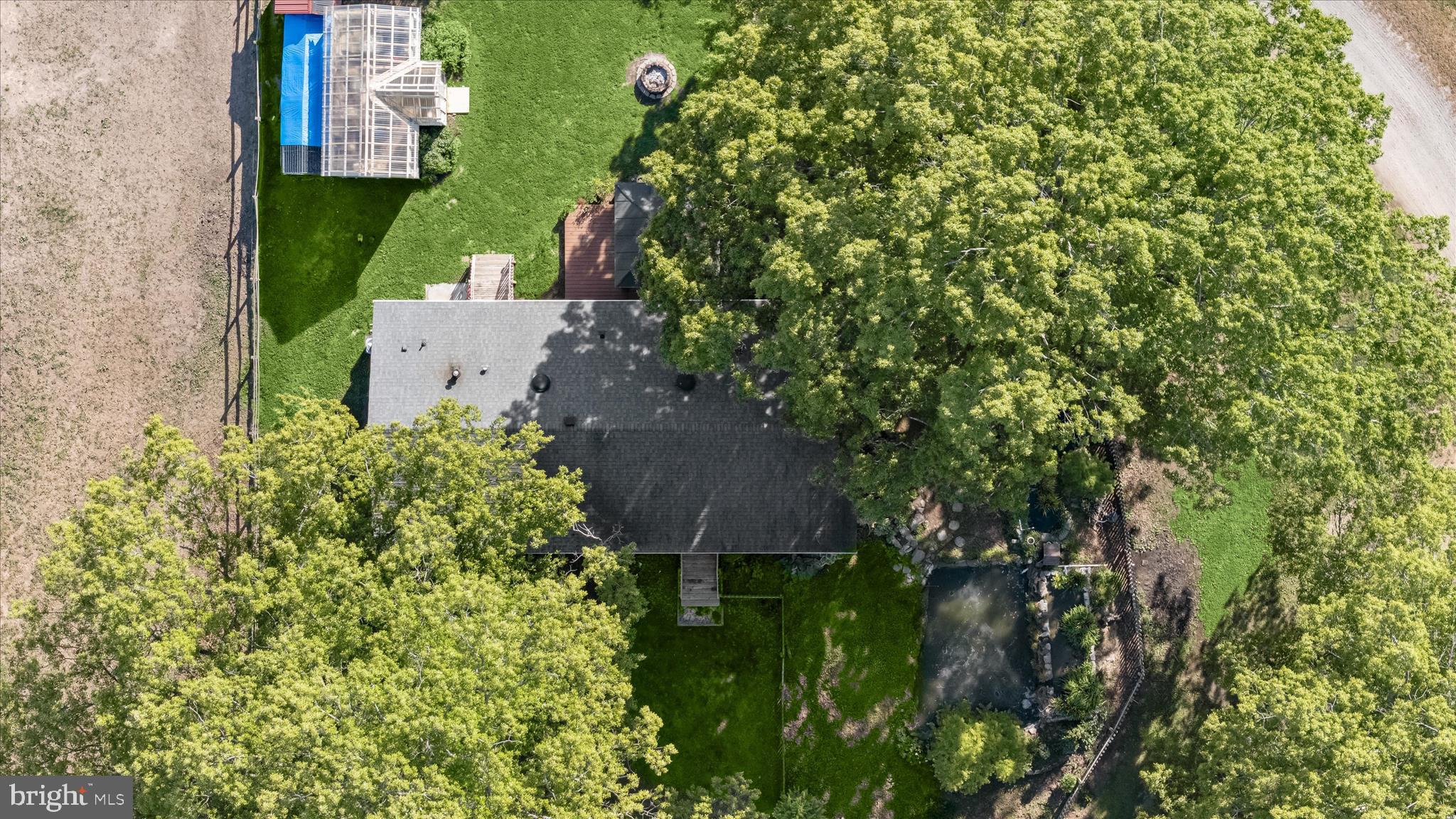 3325 Allday Road Huntingtown, MD 20639 - Photo 42 of 77 an aerial view of a house with a yard and outdoor seating