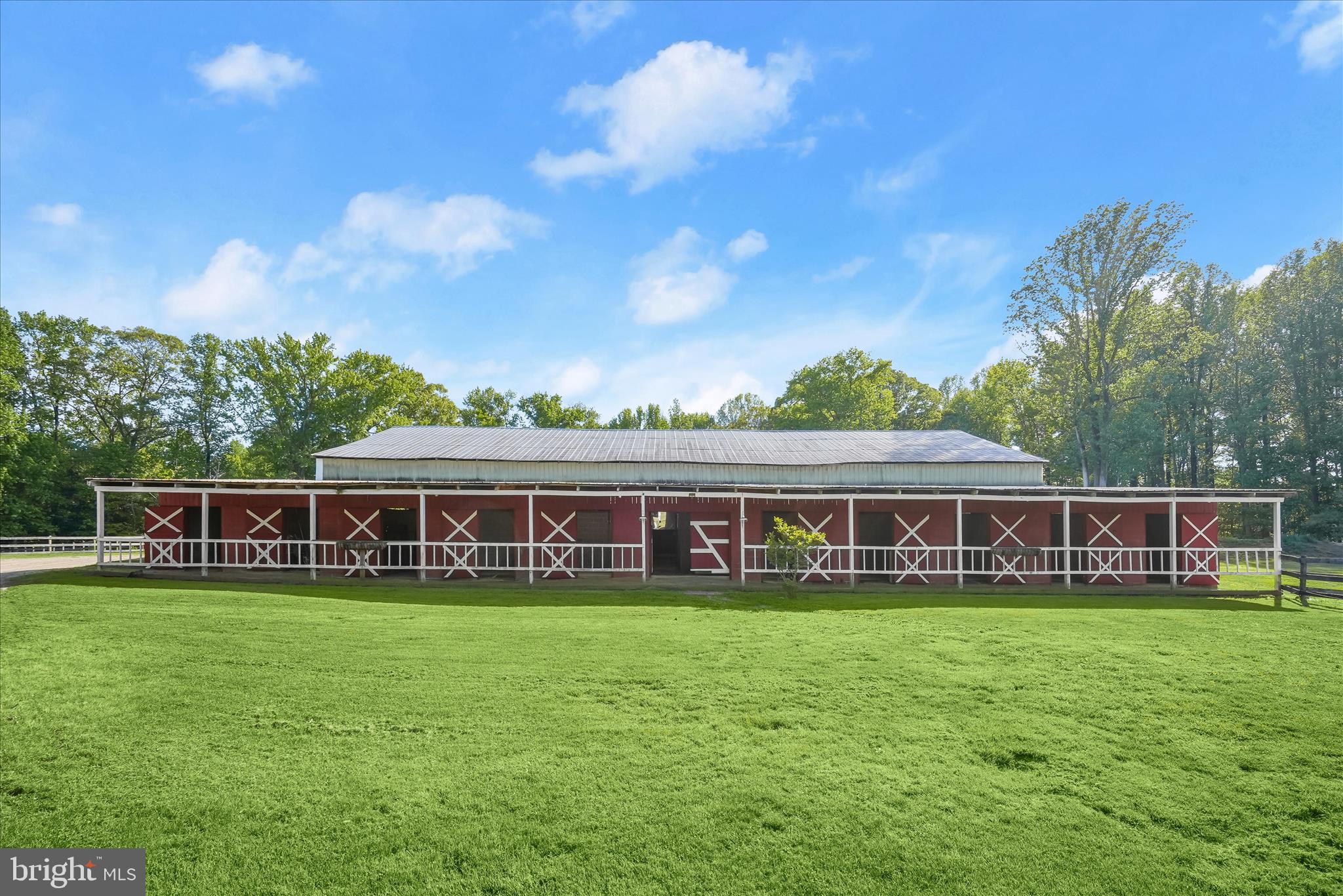 3325 Allday Road Huntingtown, MD 20639 - Photo 47 of 77 front view of a house with a big yard and large trees