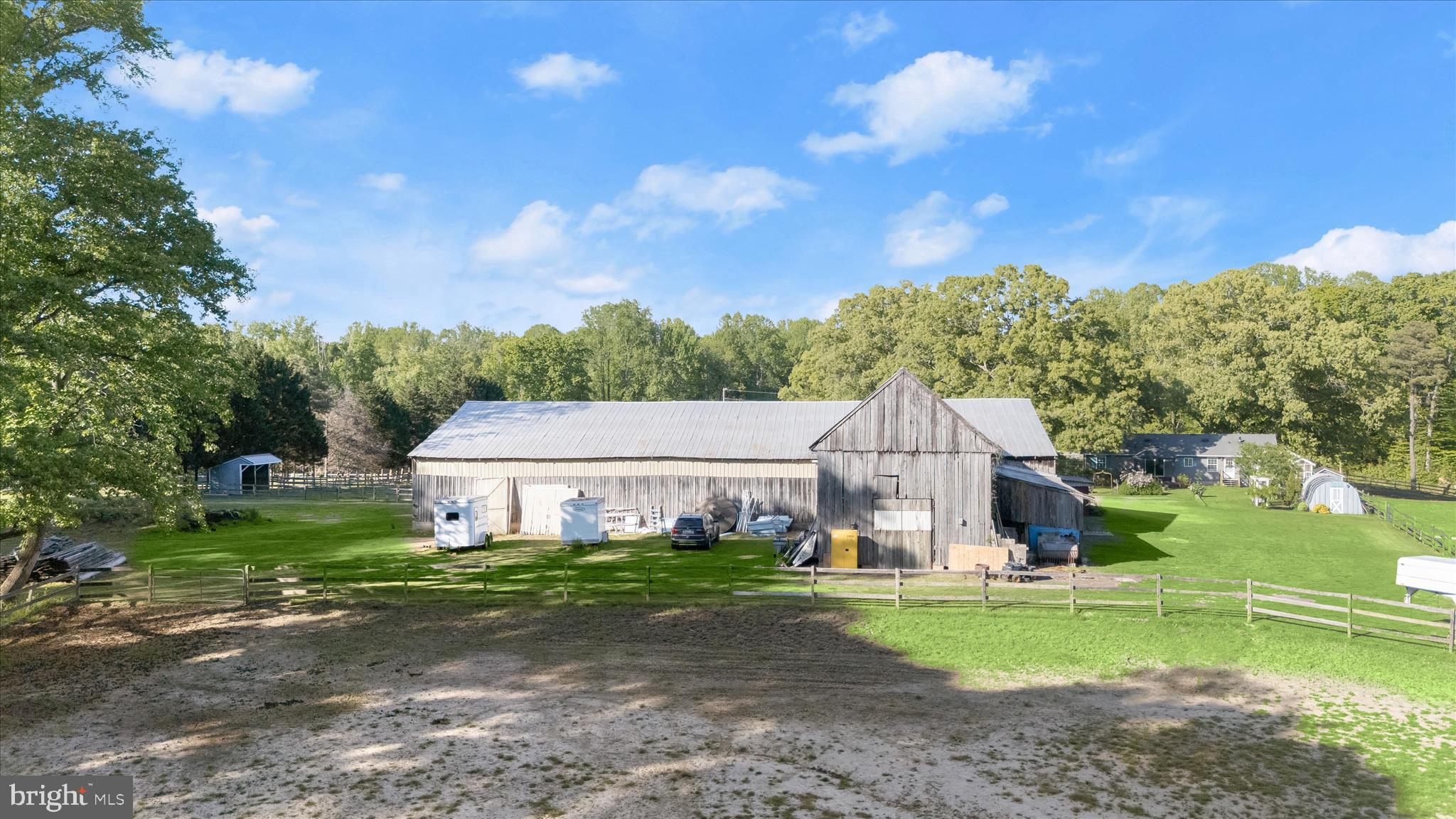 3325 Allday Road Huntingtown, MD 20639 - Photo 62 of 77 a view of a house with a big yard and large trees