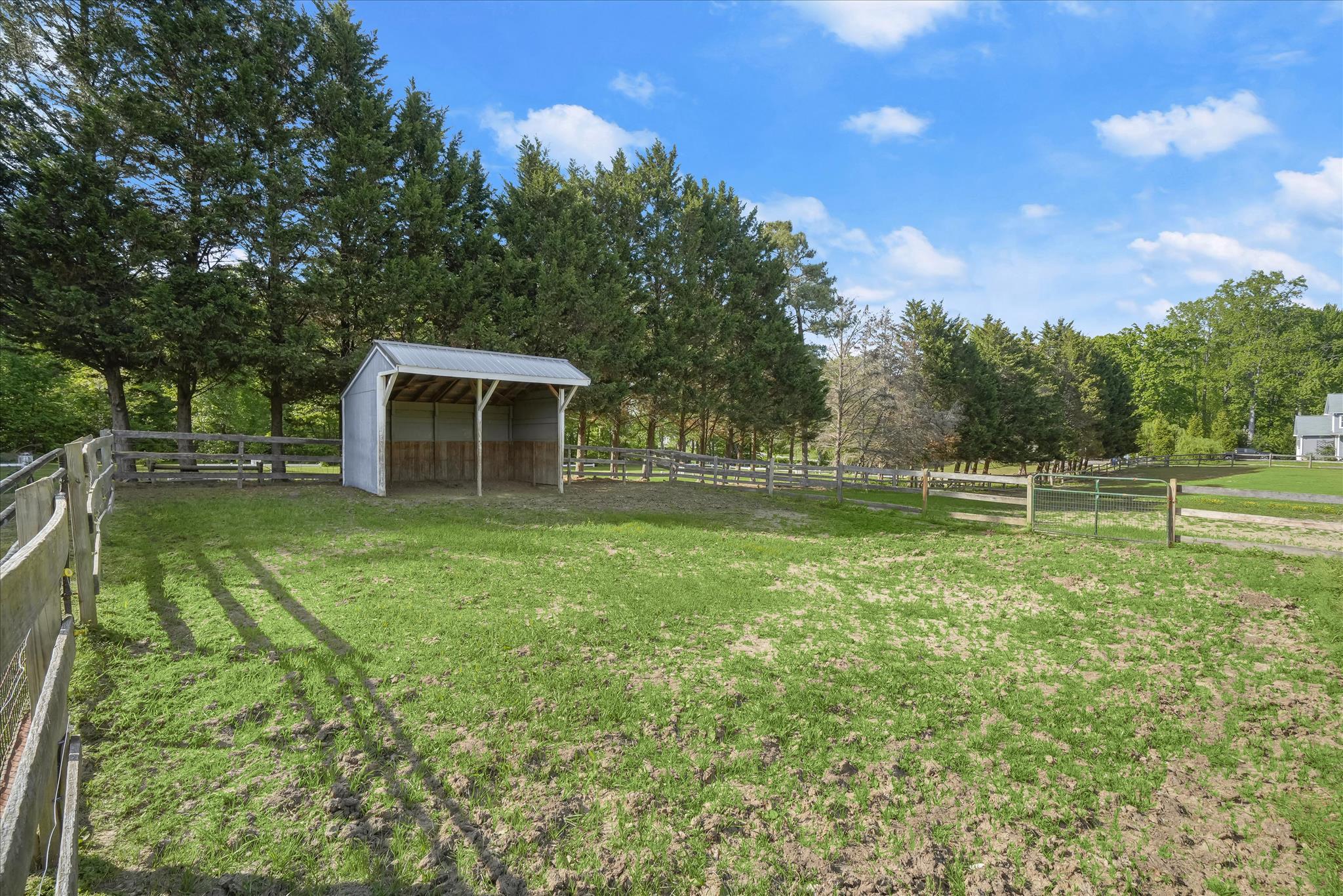 3325 Allday Road Huntingtown, MD 20639 - Photo 73 of 77 a backyard of a house with lots of green space and fountain