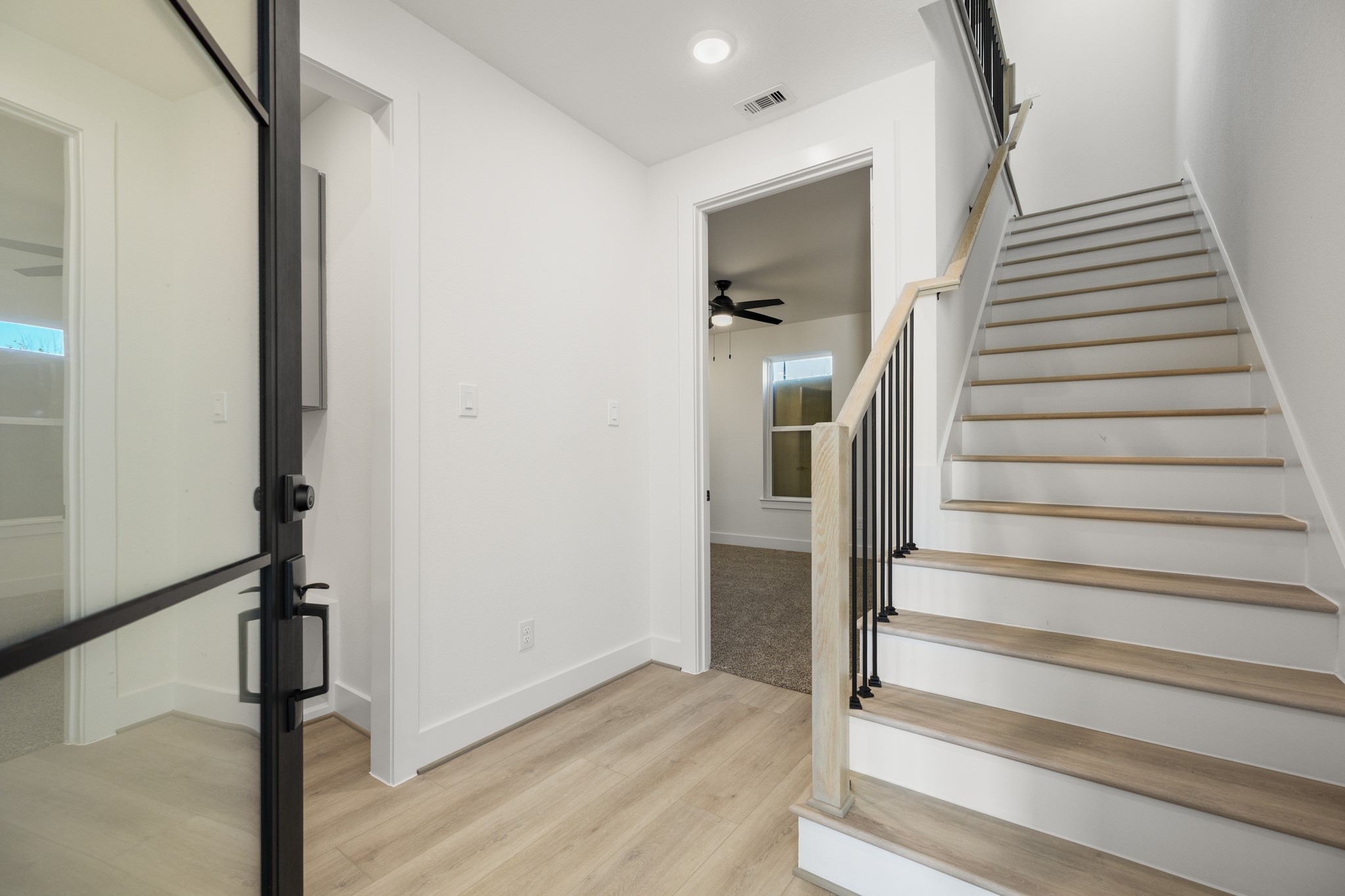 6322 Del Rio Street Houston, TX 77021 - Photo 3 of 39 a view of entryway with wooden floor