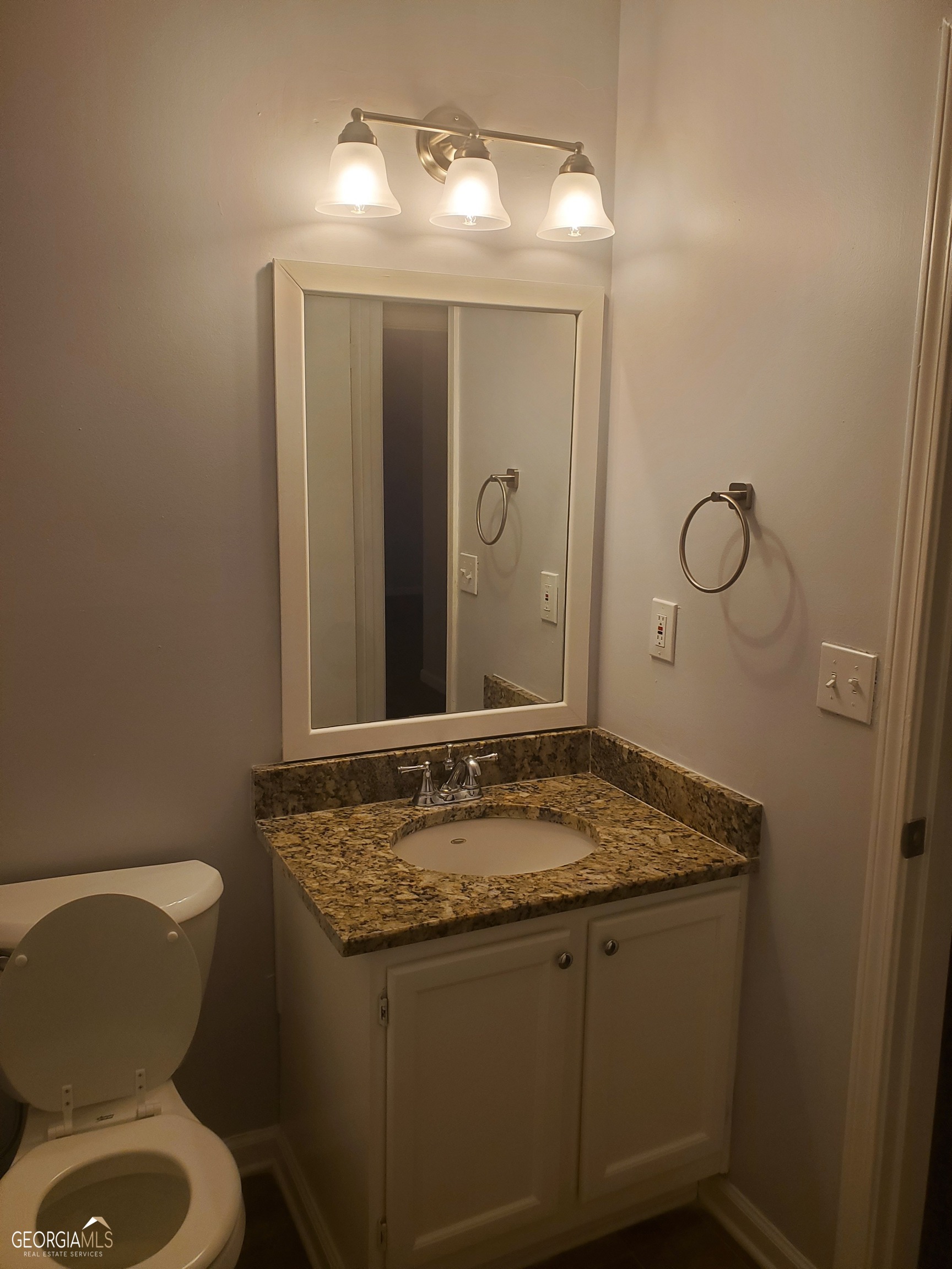 3608 Shepherds Path Decatur, GA 30034 - Photo 15 of 15 a bathroom with a granite countertop sink toilet and mirror