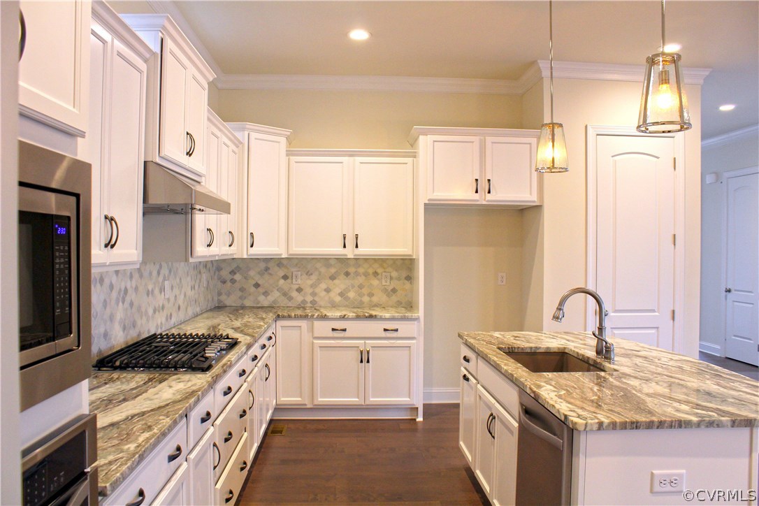 1413 Winterfield Road Midlothian, VA 23113 - Photo 8 of 33 a kitchen with stainless steel appliances granite countertop a sink stove and refrigerator
