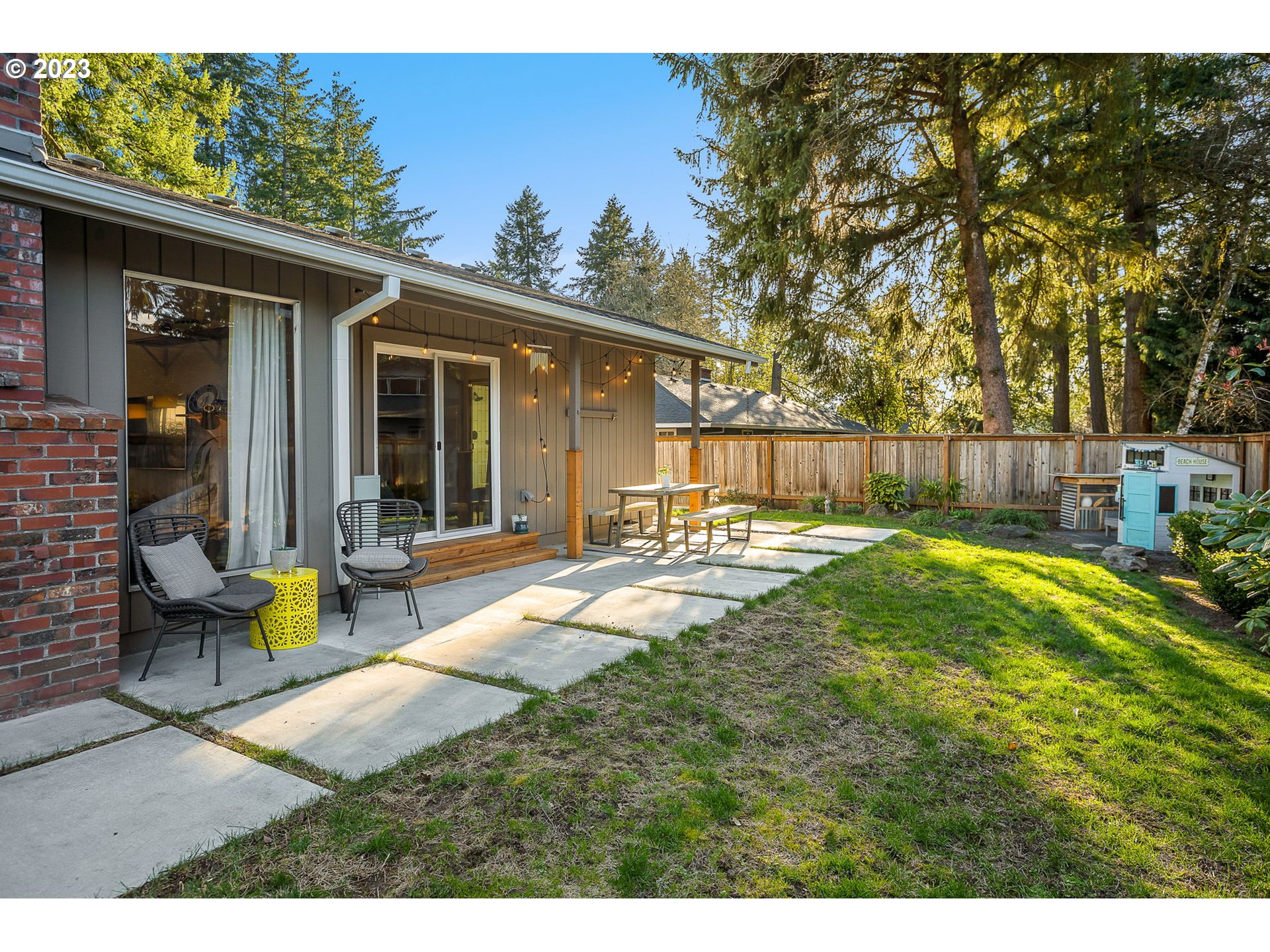 14155 Southwest Hart Road Beaverton, OR 97008 - Photo 15 of 30 a swimming pool with outdoor seating and yard