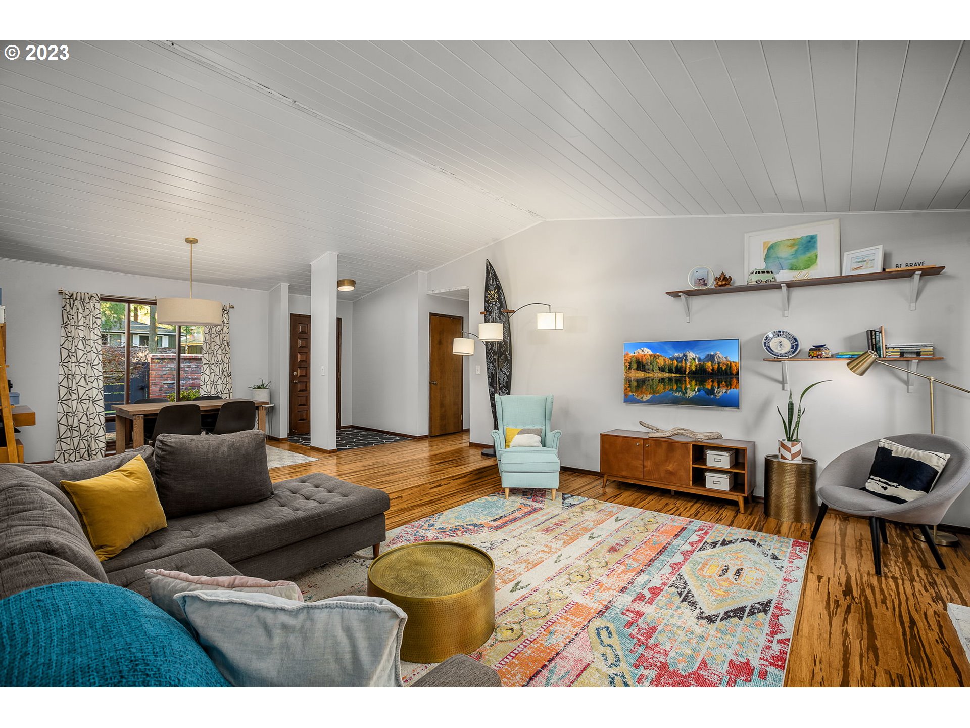 14155 Southwest Hart Road Beaverton, OR 97008 - Photo 26 of 30 a living room with furniture and a wooden floor