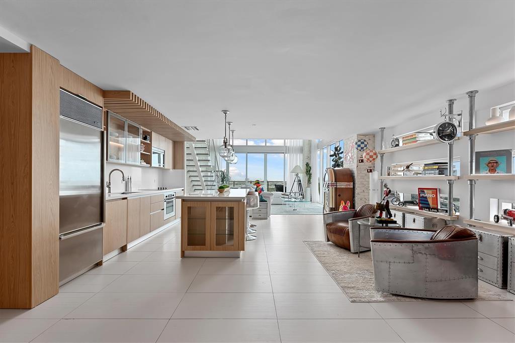 1040 Biscayne Boulevard, Unit 2101 Miami, FL 33132 - Photo 5 of 25 a kitchen with stainless steel appliances lots of counter top space