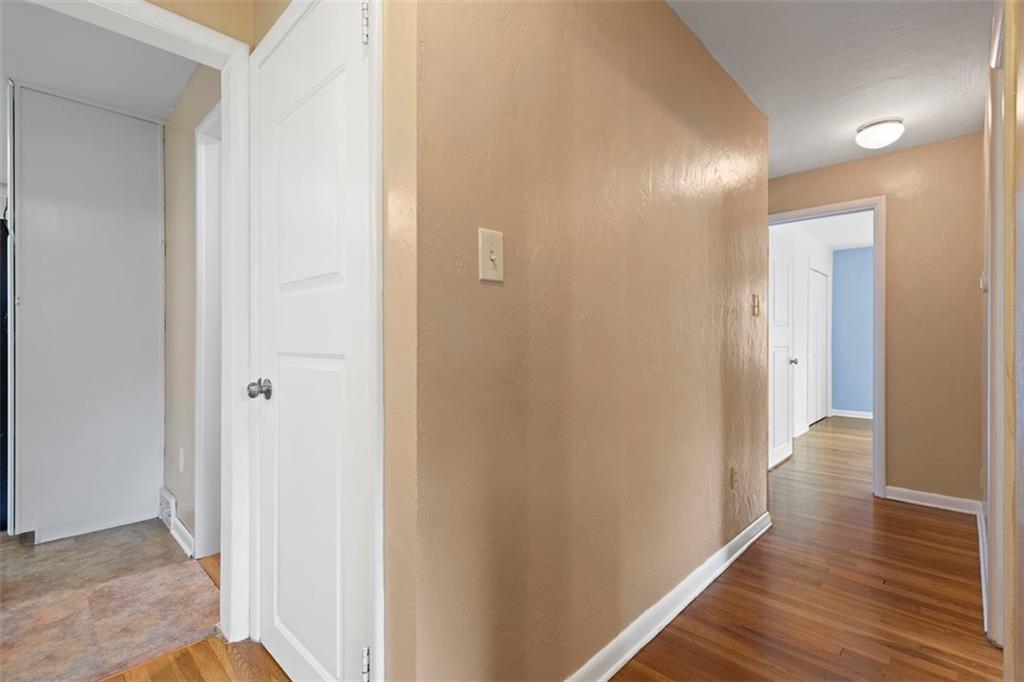 108 W Road Pittsburgh, PA 15209 - Photo 25 of 50 a view of a hallway with wooden floor