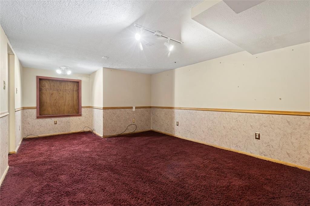 108 W Road Pittsburgh, PA 15209 - Photo 37 of 50 an empty room with entrance and windows
